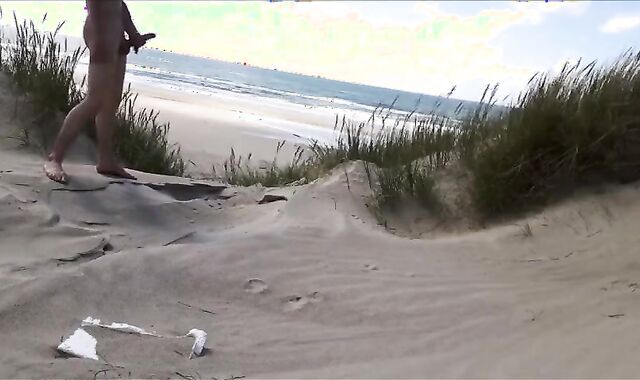 Exhibitionist Strokes Hard on the Beach 2
