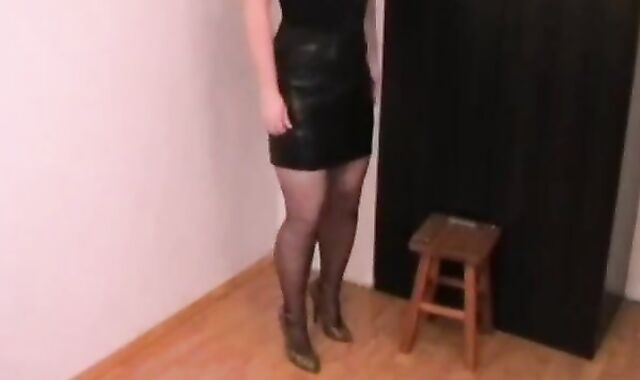 Crossdresser in Corset and Stockings
