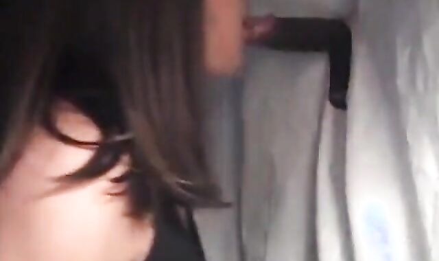 Black Cock Blowjob at Gloryhole by Crossdresser