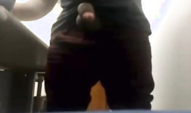 Brazilian Daddy Strokes His Big Uncut Cock at Work