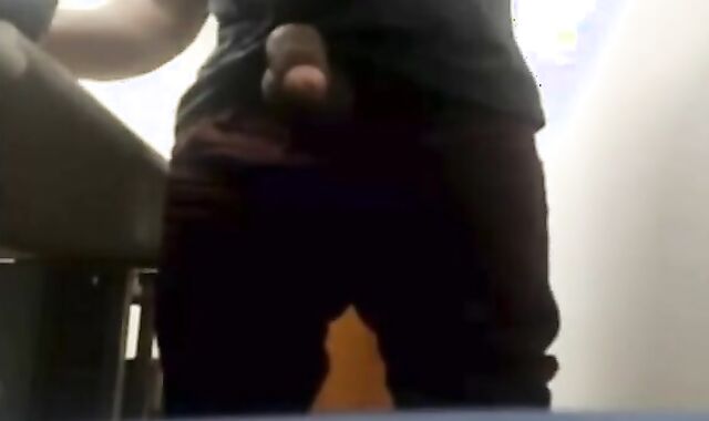 Brazilian Daddy Strokes His Big Uncut Cock at Work