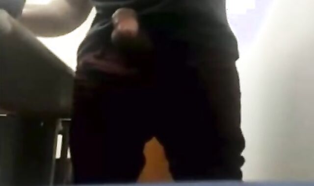 Brazilian Daddy Strokes His Big Uncut Cock at Work