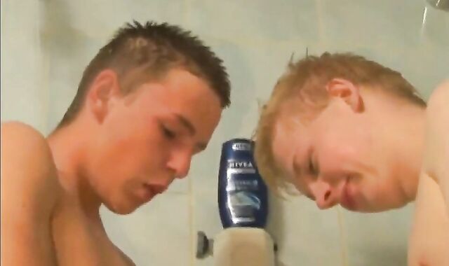 2 Twinks' Cockfight in the Shower Caught on Voyeur Cam