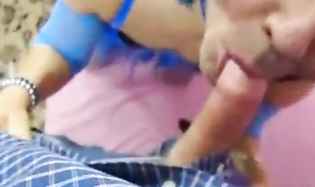 Crossdresser Deepthroats a Big Cock