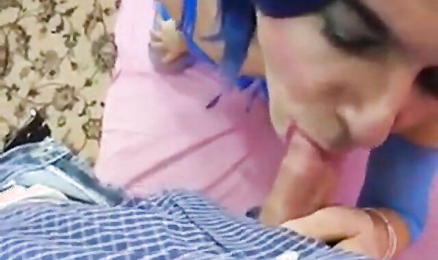 Crossdresser Deepthroats a Big Cock