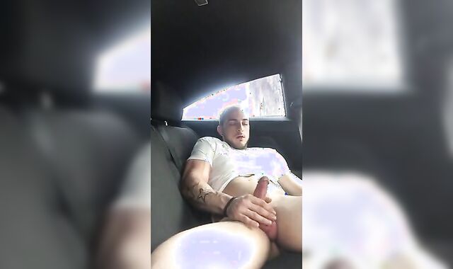 Big-Cock Guy Strokes in a Car