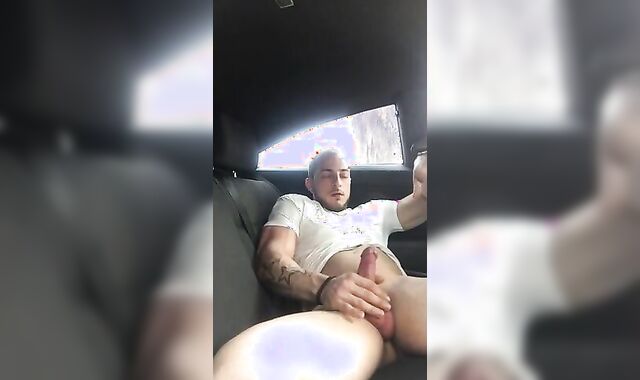 Big-Cock Guy Strokes in a Car