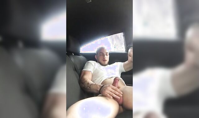Big-Cock Guy Strokes in a Car