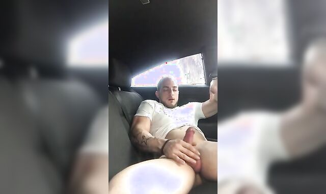 Big-Cock Guy Strokes in a Car