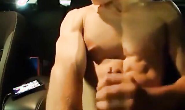 Big-Cocked Man Strokes in Car While Watching Porn 2