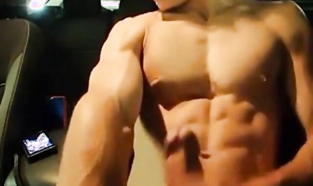 Big-Cocked Man Strokes in Car While Watching Porn 2