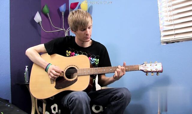 Liam Tunes His Guitar And Cock