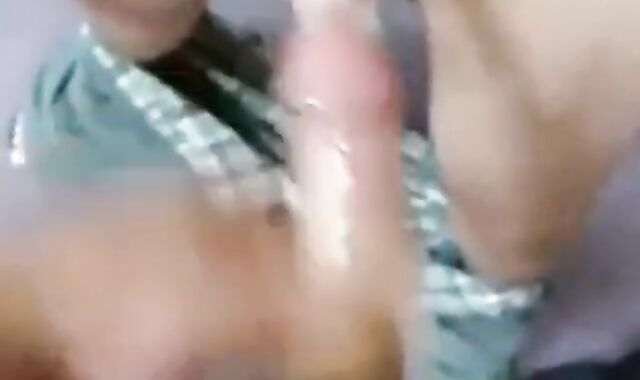 Two Guys Cum Together in a Condom