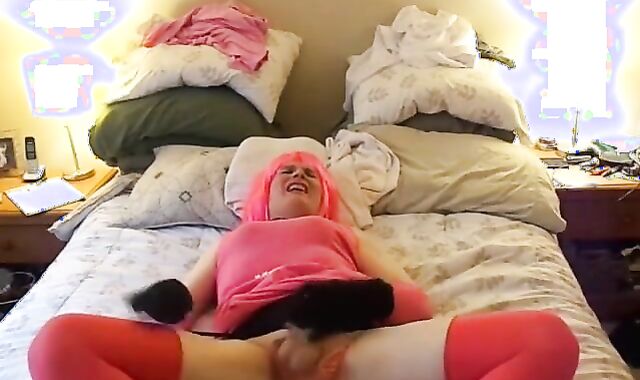 Sissy in Pink Masturbates Solo