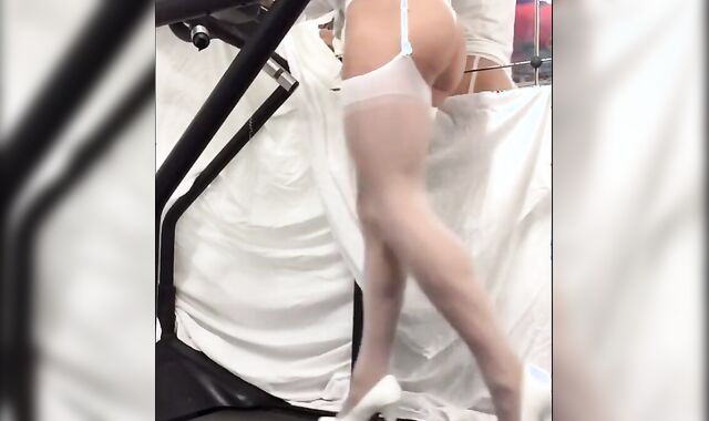 Crossdresser in White Stockings on Treadmill