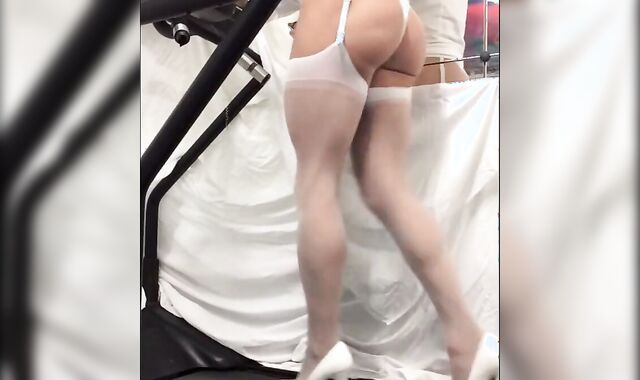 Crossdresser in White Stockings on Treadmill