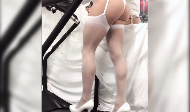 Crossdresser in White Stockings on Treadmill