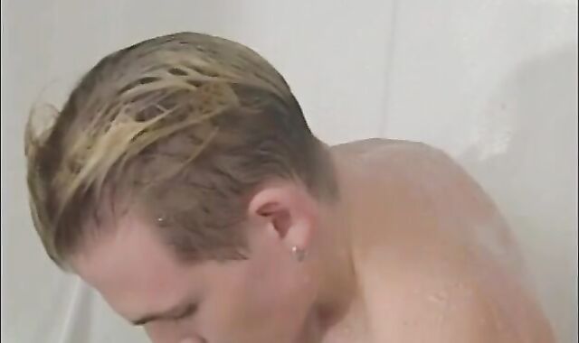 light-haired teenager jacks and finishes off on himself