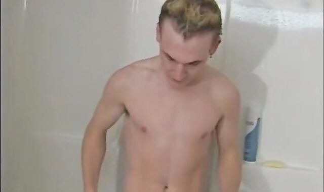 light-haired teenager jacks and finishes off on himself