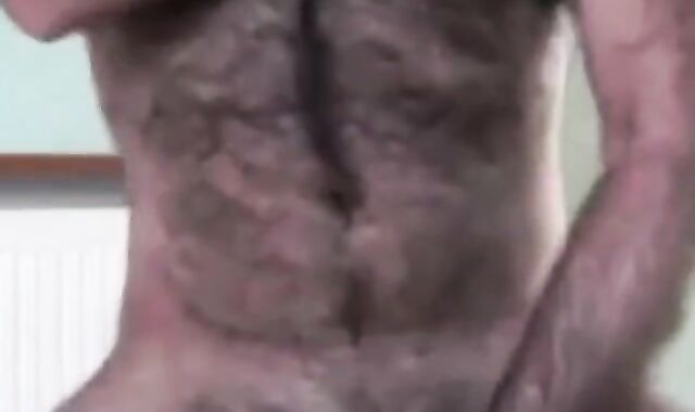 Hairy Daddy Strokes His Cock