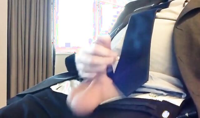 Suited Silver Fox Jerks Off Solo