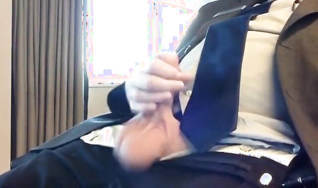 Suited Silver Fox Jerks Off Solo