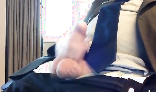 Suited Silver Fox Jerks Off Solo