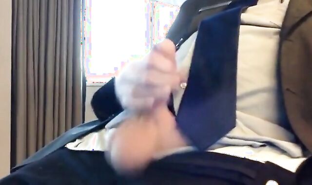 Suited Silver Fox Jerks Off Solo