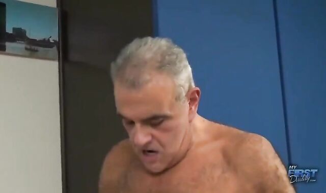 Father Grizzly pounds A lad