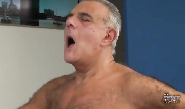 Father Grizzly pounds A lad