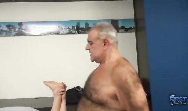 Father Grizzly pounds A lad