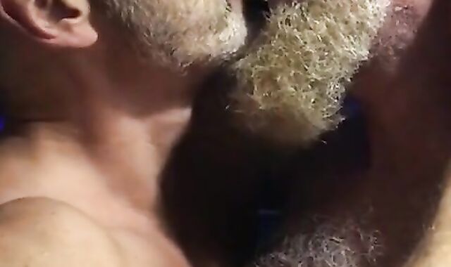 Muscular Daddies Intimately Kissing