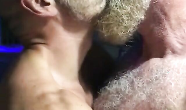 Muscular Daddies Intimately Kissing