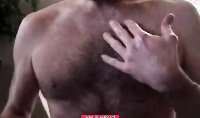 Hairy bear daddy strokes his meat 2