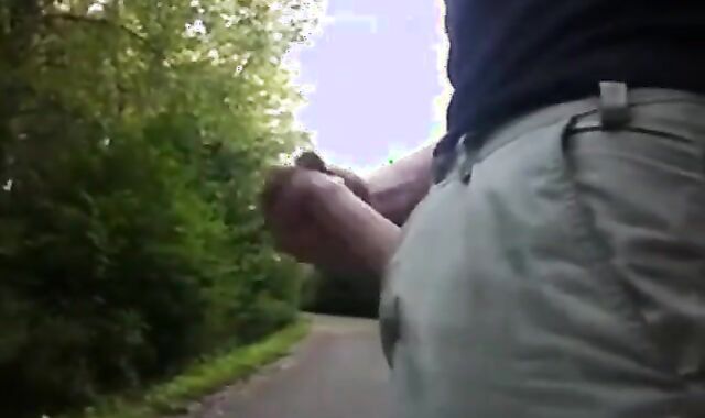 Outdoor Handjob for a Big-Cocked Hunk