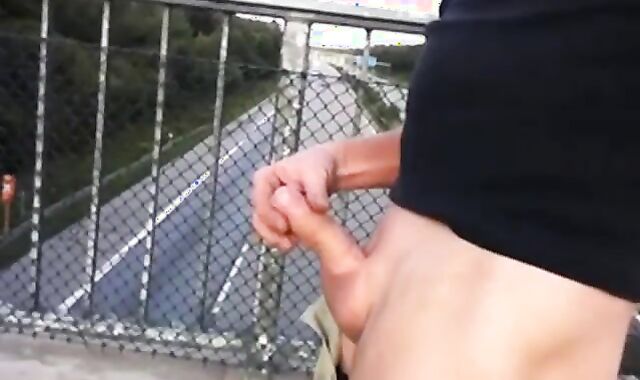 Outdoor Handjob for a Big-Cocked Hunk