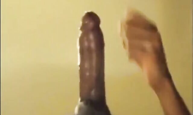 Black guy jacks off his big cock and cums hard