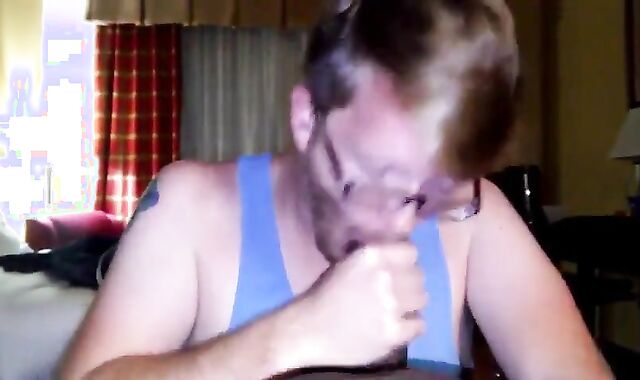 Big Black Cock Gets Serviced by a Hungry White Mouth