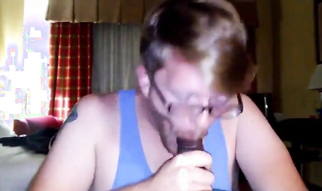 Big Black Cock Gets Serviced by a Hungry White Mouth