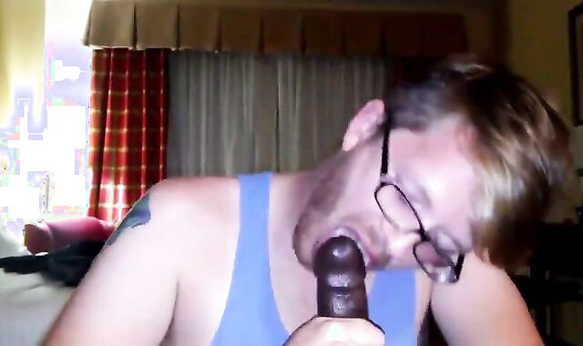 Big Black Cock Gets Serviced by a Hungry White Mouth