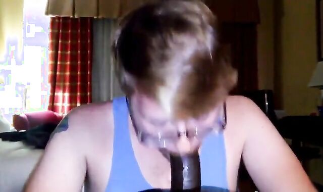 Big Black Cock Gets Serviced by a Hungry White Mouth