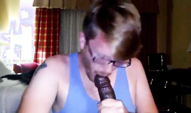 Big Black Cock Gets Serviced by a Hungry White Mouth