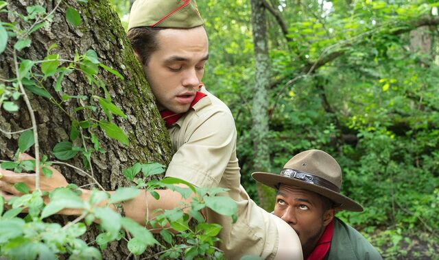 Scout boy meets black anaconda in the jungle!