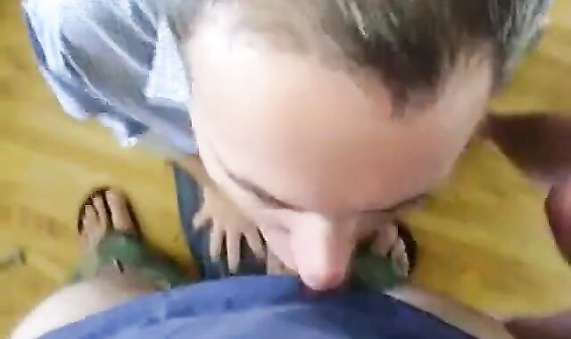 Amateur Takes On Two in a Group Blowjob