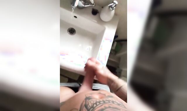 Tattooed Hunk Strokes His Big Cock Alone