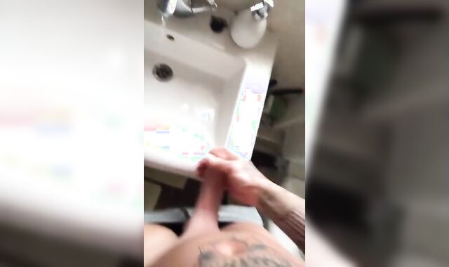 Tattooed Hunk Strokes His Big Cock Alone