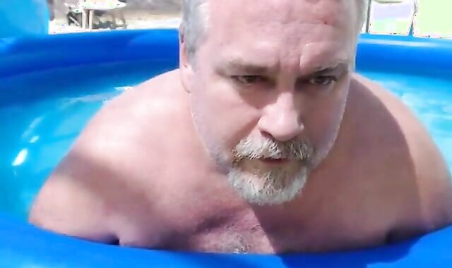 Bearded Daddy Plays Naked by the Pool