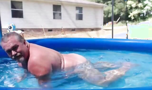 Bearded Daddy Plays Naked by the Pool