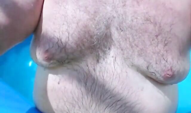 Bearded Daddy Plays Naked by the Pool