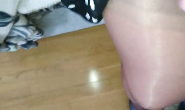 Sissy in Layered Nylons Uses Glory Hole